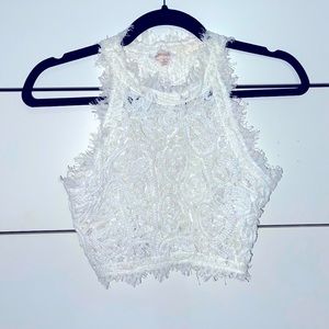 White embroidery mesh with zip on the side